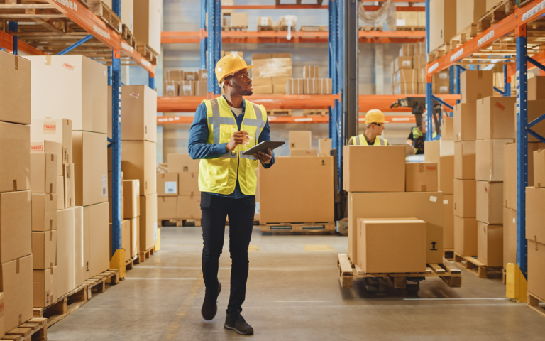Shipper logistics team reviewing rates in Atlas TMS