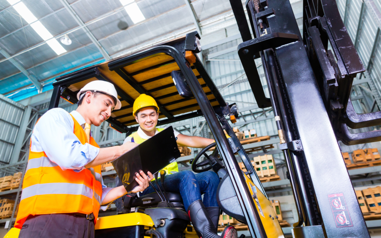 Atlas TMS freight claims management dashboard on a laptop