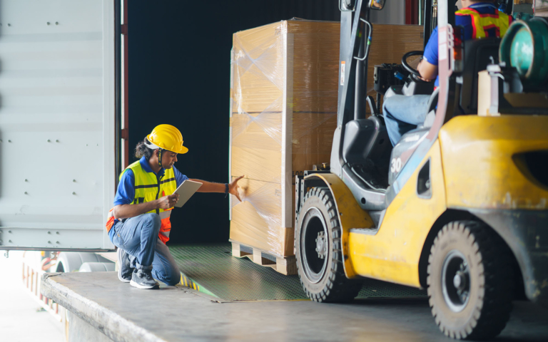 Warehouse coordinator managing dock door appointments