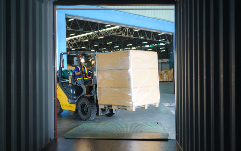 Drayage container being loaded at port