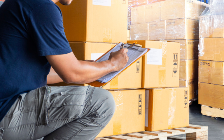 Claims specialist assembling freight claim documentation