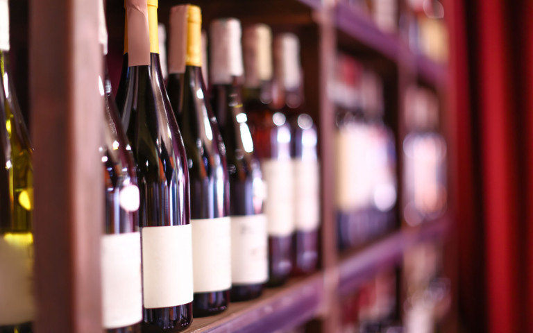 Beverage bottles on a retail shelf