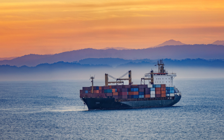Ocean freight ship at dusk