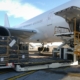 Airplane being loaded with packages