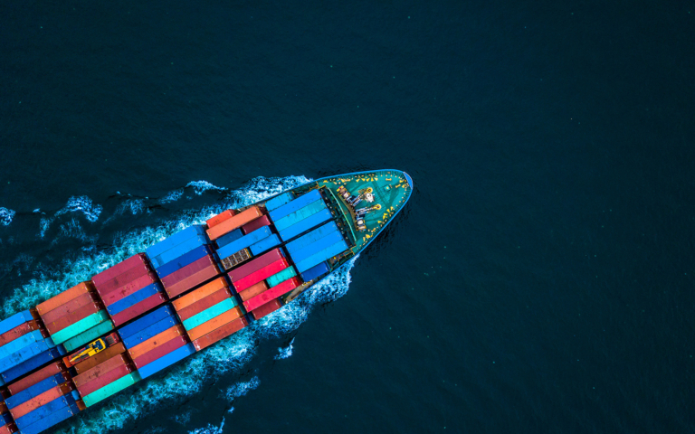 Aerial drone view of a container ship, global freight forwarding