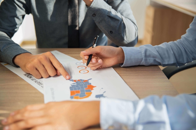 Licensed customs brokers reviewing import documentation
