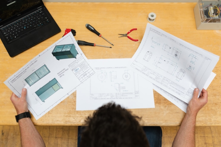 Engineer examining a product design to attract a lower-duty tariff provision