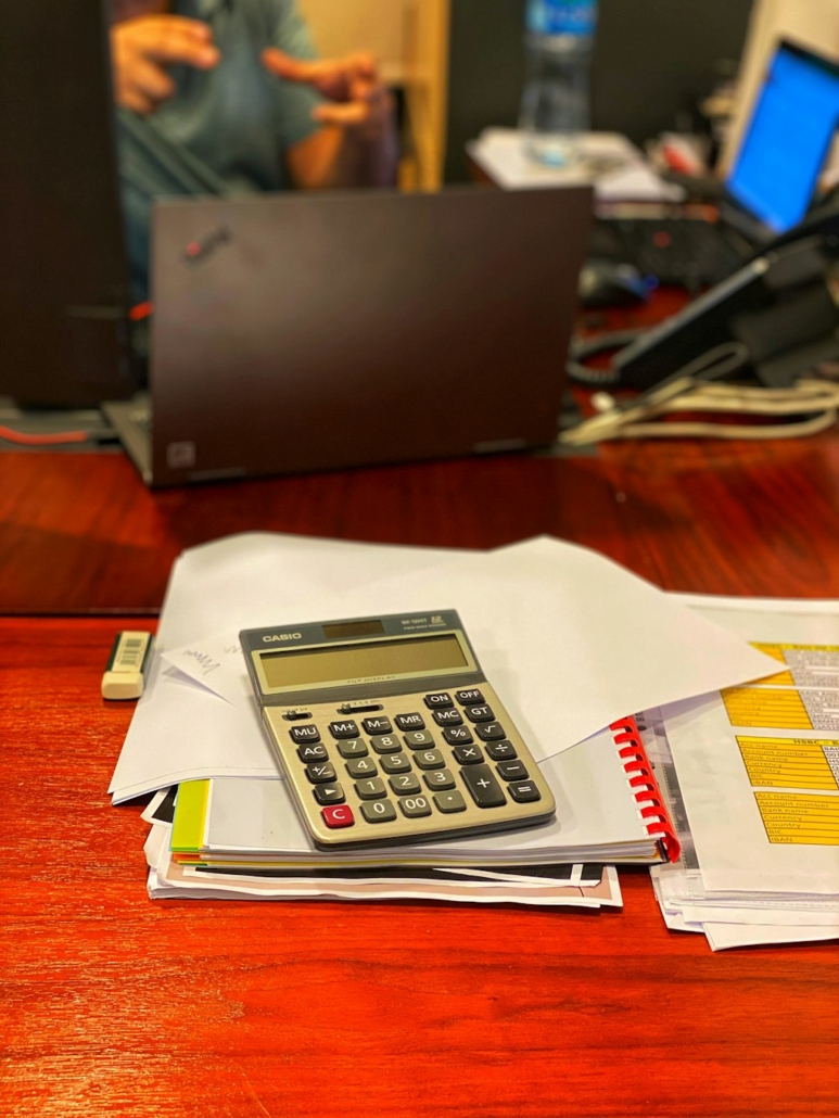Accounting clerk reviewing freight invoices and AR aging