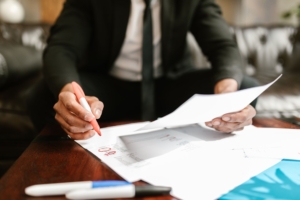 Businessman reviewing documents at a desk